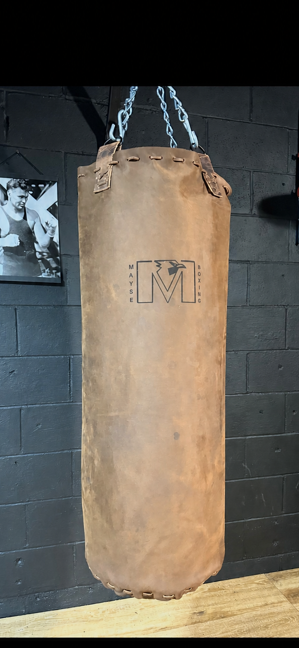 Vintage leather heavy bag. 36”x16”.