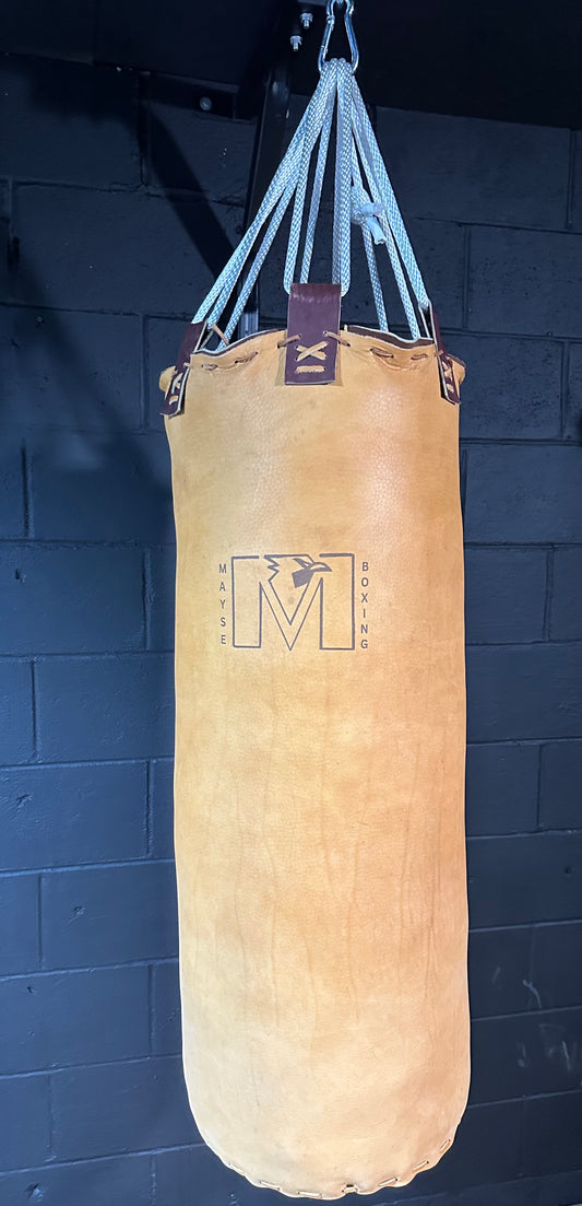 Vintage Tan Deerborn leather vintage heavy bag. 36”x16”.