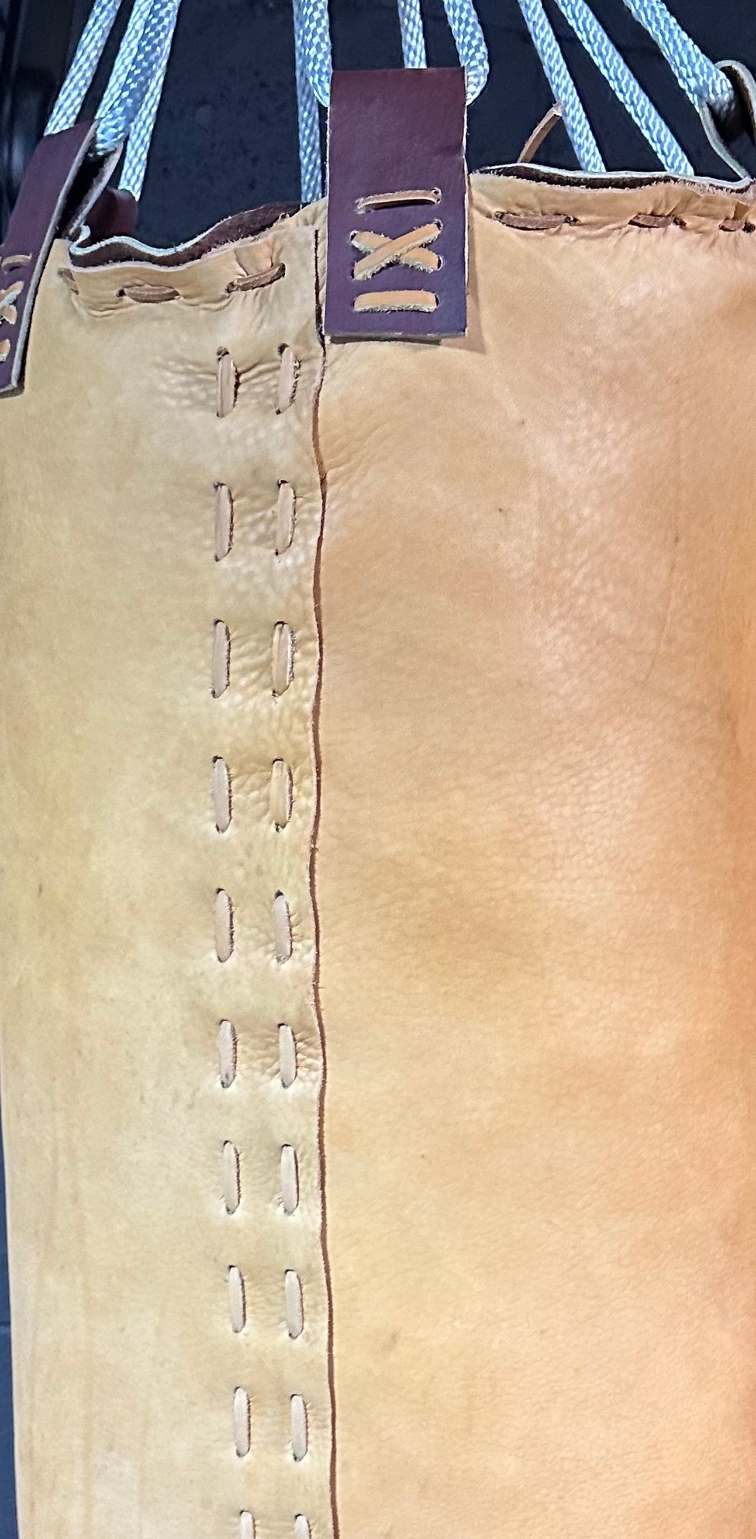 Vintage leather heavy bag. 36”x16”.